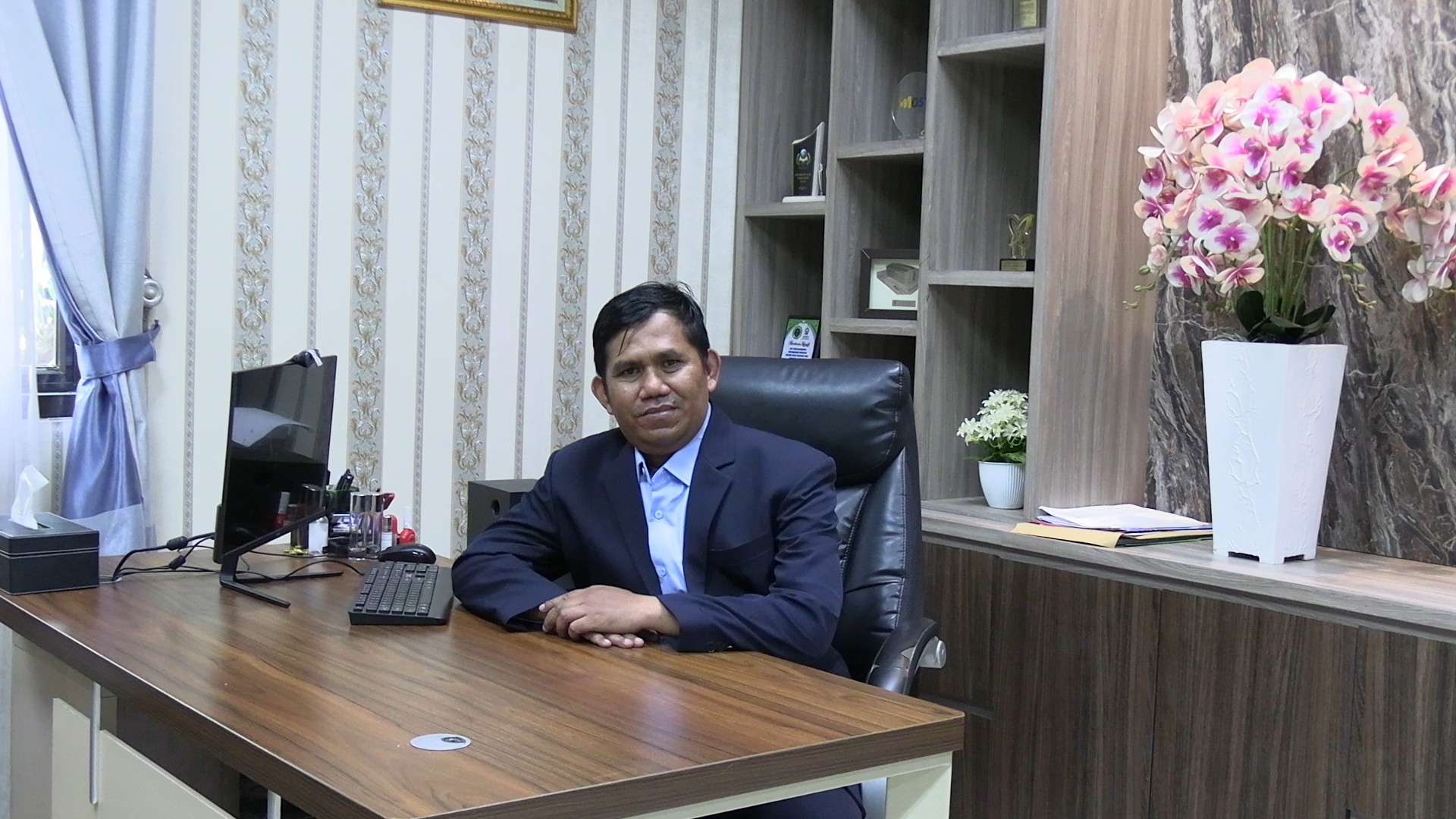 Usman, S.Sos., M.Si.